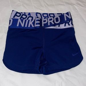 Navy blue Nike pros (S)